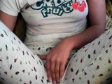 Amateur girl rubs her pussy through pajamas