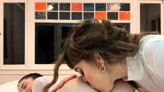 Two sexy brunette lesbians licking each others pussies