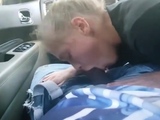 AMATEUR BLONDE SUCKING A BIG BLACK COCK IN A CAR