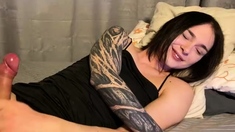 Big tit shemale jerks her long cock