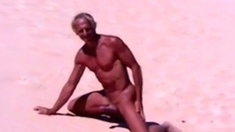 Tanned guy on beach in tiny string thong (temporarily!)